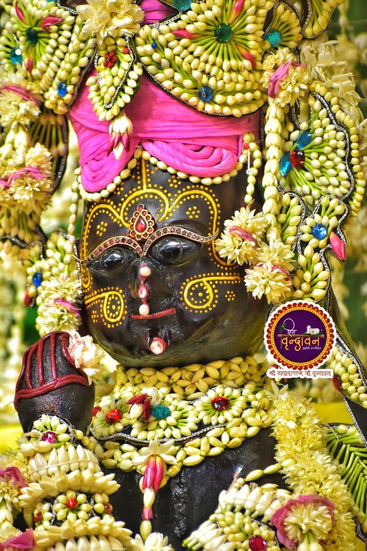 Shri Radhavallabh deity adorned with flowers